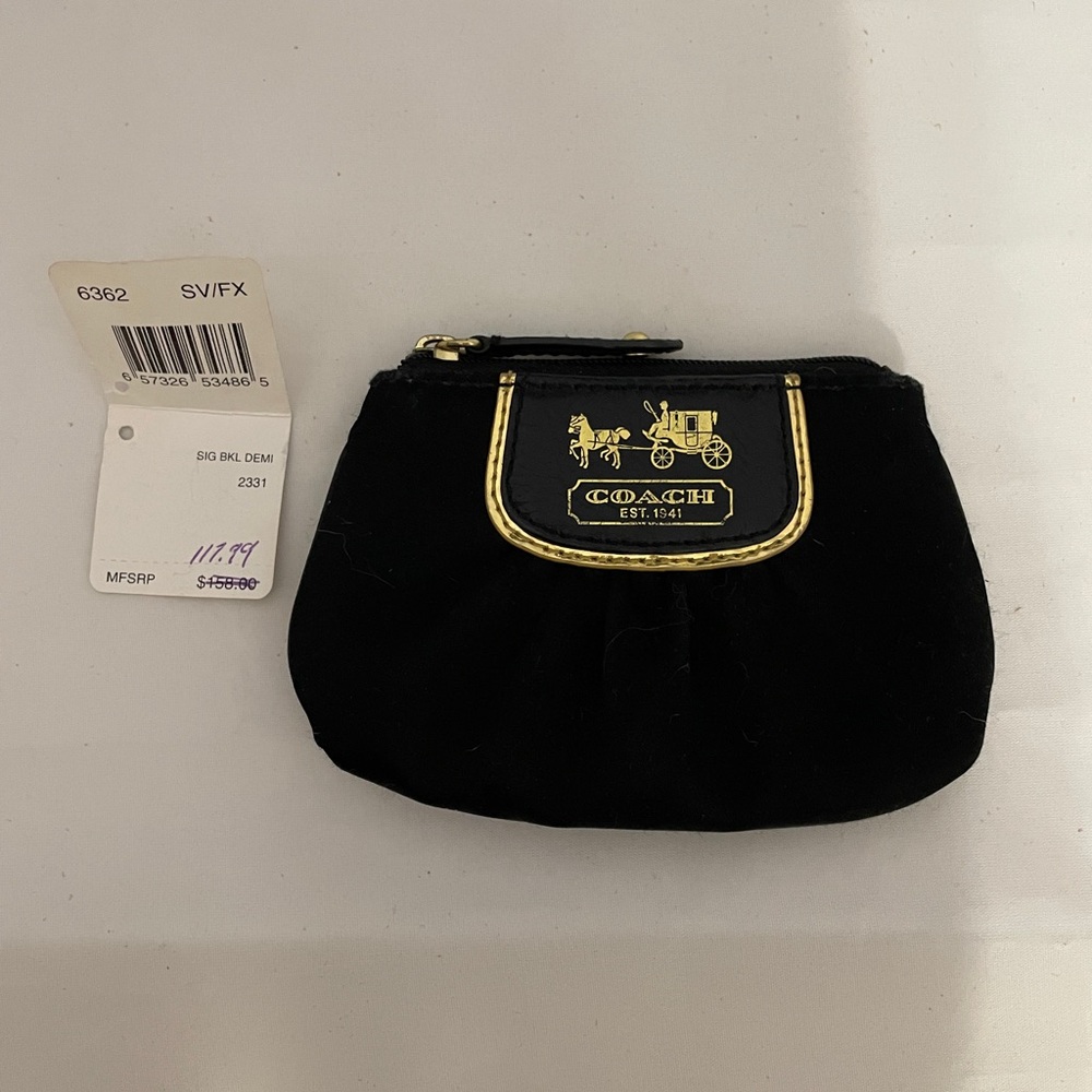 Coach Black Pouch with Gold Detailing